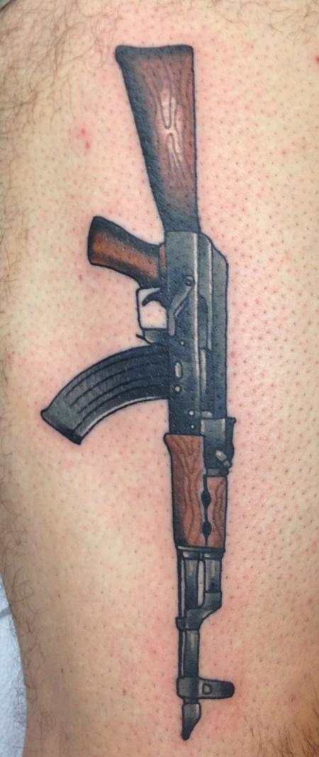 Gary Dunn - traditional color AK-47 tattoo